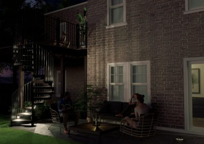 exterior evening scene with lit spiral stairs